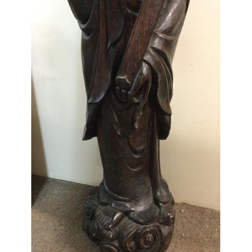 953 - WITHDRAWN -  A large Chinese root carving in he form of Quan Yin . 90 cm