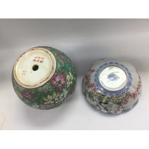 965 - A box of Oriental ceramics comprising a large famille rose bowl, approx diameter 35.5cm, a ginger ja... 