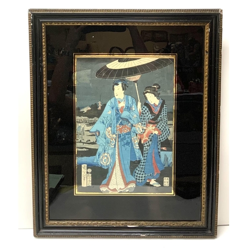 985 - A Japanese Woodblock print of a male and female in traditional dress, c.1860. (Possibly Kunichika) 5... 