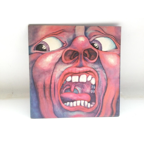 12 - A first UK pressing of 'In The Court Of The Crimson King' by King Crimson. Vinyl Ex.