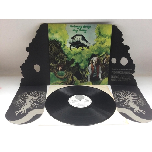 13 - A first UK pressing of 'Heavy Petting' by Dr Strangely Strange housed in a fold out die cut sleeve. ... 