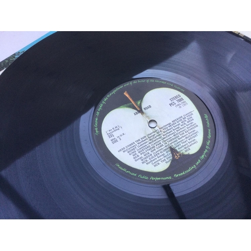 141 - A first UK pressing of 'Abbey Road' by The Beatles, vinyl Ex. Comes together with the 'blue' and 're... 