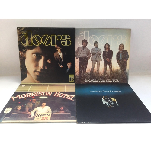 17 - Four LPs by The Doors comprising the self titled debut, 'Waiting For The Sun', 'The Soft Parade' and... 