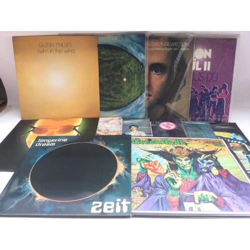 23 - Twelve prog rock LPs by various artists including Tangerine Dream, Greenslade, Amon Duul II and othe... 