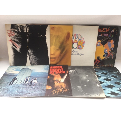 42 - Eight rock LPs by various artists including The Rolling Stones, Queen and The Who.