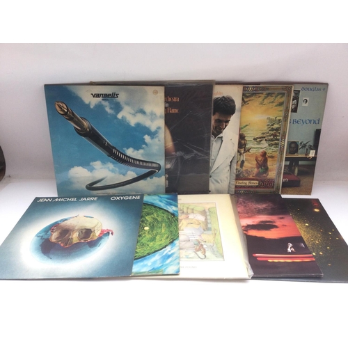 51 - Two bags containing 20 prog rock, fusion and ambient LPs by various artists including Curved Air, Ta... 