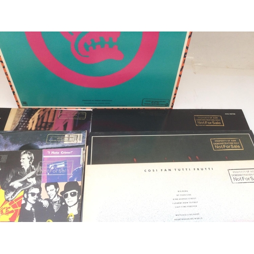 57 - Fifteen promotional copy LPs by various artists including The Police, Squeeze, Peter Frampton and ot... 