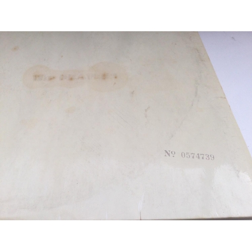 8 - A numbered Beatles 'White Album' 0574739 with black inners and poster but no portraits. Vinyl in Ex ... 