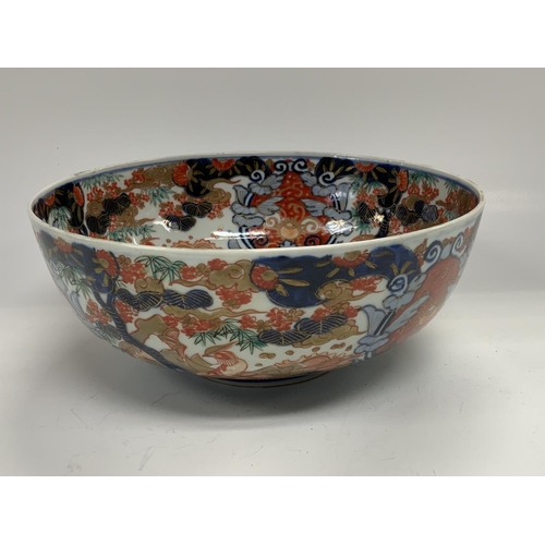 1112 - A Japanese Imari porcelain bowl with under-glazed mark to base. 23cm Diameter x 9.5cm together with ... 