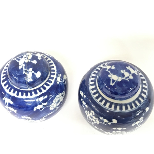 1114 - Chinese blue and white ginger jars decorated with cherry blossom trees, 14cm tall. Some restored dam... 