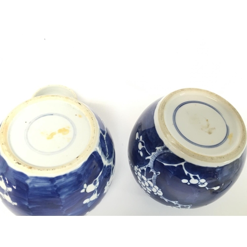 1114 - Chinese blue and white ginger jars decorated with cherry blossom trees, 14cm tall. Some restored dam... 