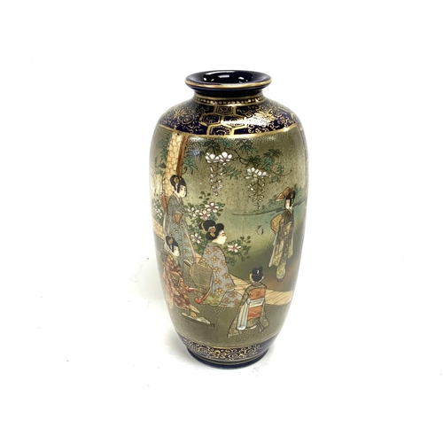 1115 - A small Japanese satsuma pottery vase with blue ground, with 2 hand painted traditional scenes.