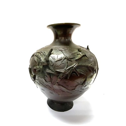 1138 - A Japanese Meiji period bronze squat form vase with raised relief bird decoration. H.25cm. (C)