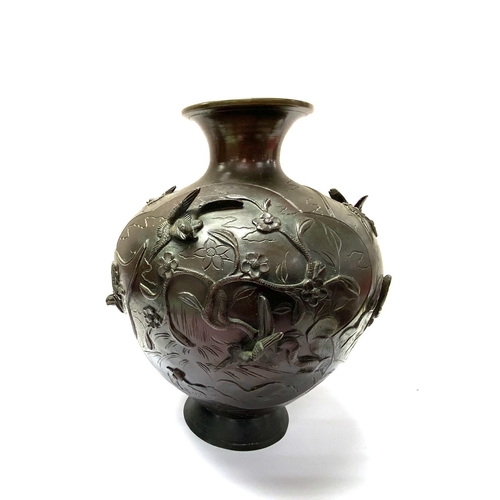 1138 - A Japanese Meiji period bronze squat form vase with raised relief bird decoration. H.25cm. (C)