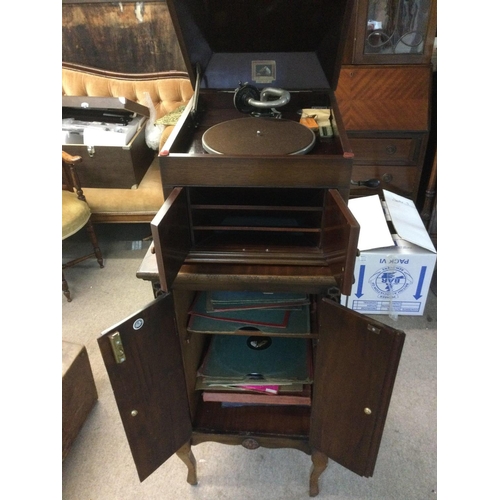 2253 - An HMV gramophone with conforming record cabinet and classical 78s (2). Shipping category D.