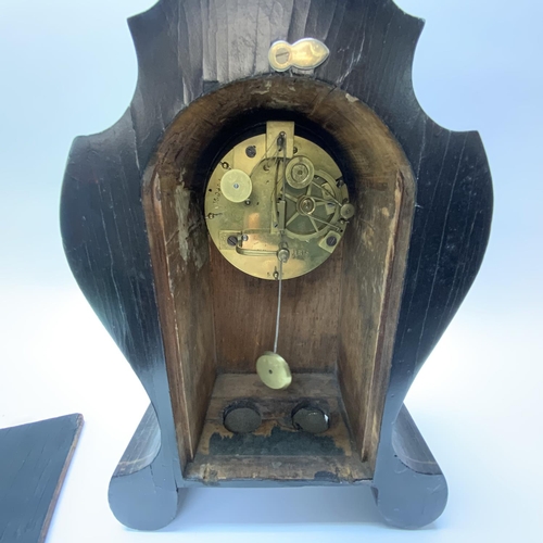 902 - A Victorian rosewood veneered mantle clock inset with boxwood veneer, silvered dial marked Laine A P... 