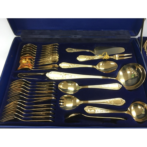 930 - A solingen gilt cutlery set. Postage C