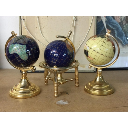 940 - Three small gem stone globes 14 cm .