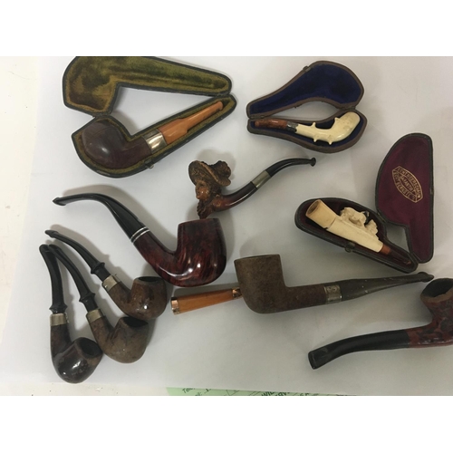 948 - A collection of Meerchaum and other vintage tobacco pipes.