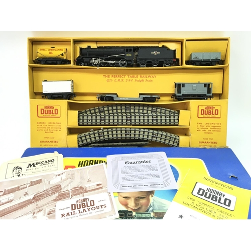 103 - A Boxed Hornby Dublo Electric Train Set. G25 L.M.R. 2-8-0 Freight Train.