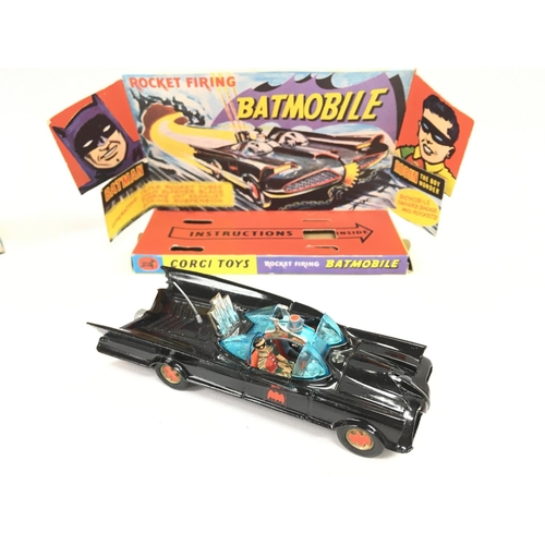 106 - A Boxed Corgi Batmobile #267. Sticker Missing.