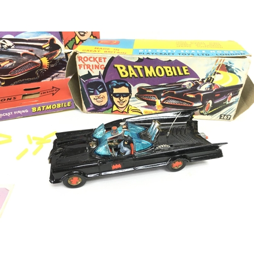 107 - A Boxed Corgi Batmobile #267. Box is worn. Original rockets and sticker Missing.