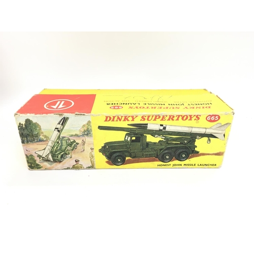 108 - A Boxed Dinky Super Toys Honest John Missle Launcher. #665 A/F.