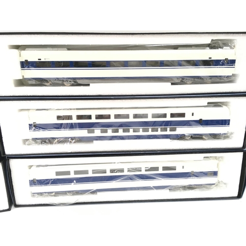 124 - A Japanese Katsumi KTM HO Gauge 6 Car Train Set. 2 X Bullet Locos 4 X Coaches.