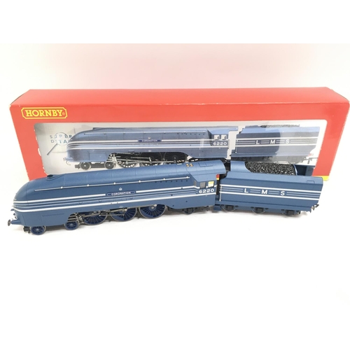 139 - A Boxec Hornby 00 Gauge LMS 4-6-2 Coronation Class 6220 # R2206.