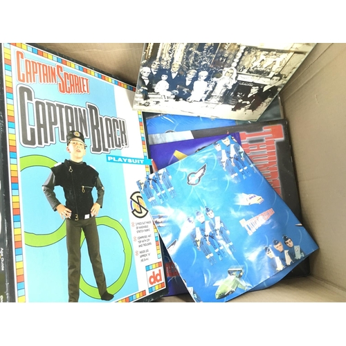 156 - A Box Containing a Collection of Thunderbirds Masks. mugs. a Clock. Board Games posters Etc.