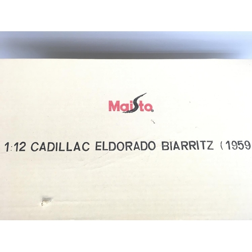 184 - A Boxed Maisto 1:12 Scale Cadillac Eldorado Biarritz 1959.