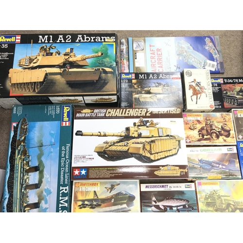 192 - A Box Containing a Collection of Various Model Kits Including Tanks. Aircraft. And A Titanic.