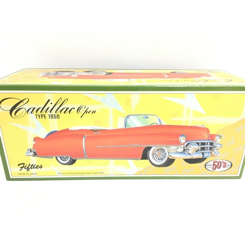 195 - A Boxed Cadillac Open Type 1950 Tin Car.