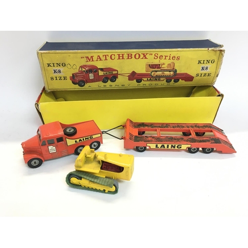 228 - A Boxed Matchbox King Size K-8 Laing Prime Mover Transporter with Caterpillar Tractor Trailer.