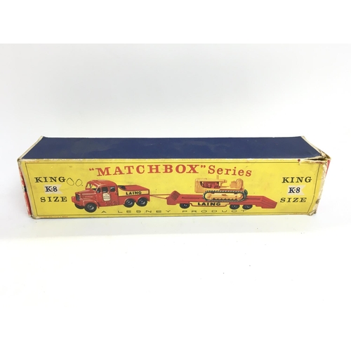 228 - A Boxed Matchbox King Size K-8 Laing Prime Mover Transporter with Caterpillar Tractor Trailer.