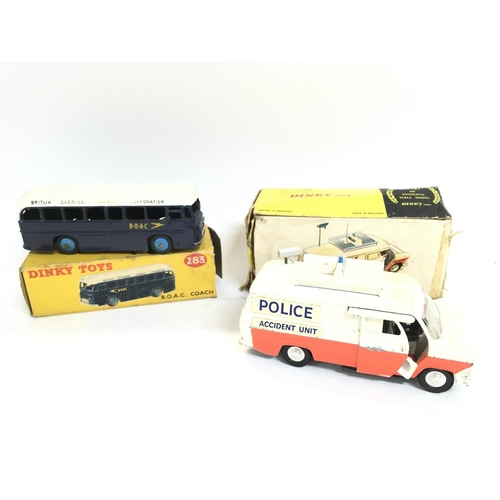 229 - A Boxed Dinky Toys B.O.A.C Coach #283 and a Police Accident Unit. #287. Both boxes Worn.