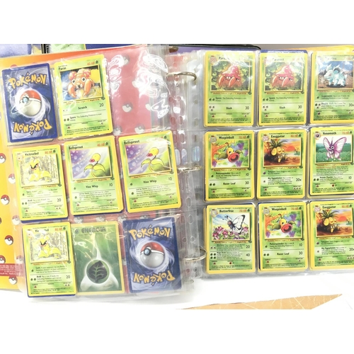 23 - 4 Binders Containing a Collection of vintage PokÃ©mon Cards.