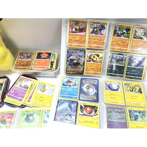 24 - A Box Containing A Collection of Modern PokÃ©mon Cards Including 4 Small Binders.