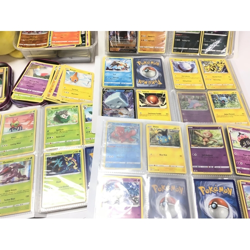 24 - A Box Containing A Collection of Modern PokÃ©mon Cards Including 4 Small Binders.