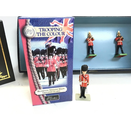 242 - A Collection of Boxed Britains Soldiers. Including Band Of The Life Guards #00157. Walking Cyclist #... 