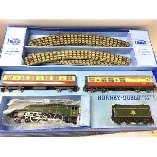 25 - A Large Collection of Hornby Dublo. Including Locos. Sets. Platform. Track. Etc.(3).