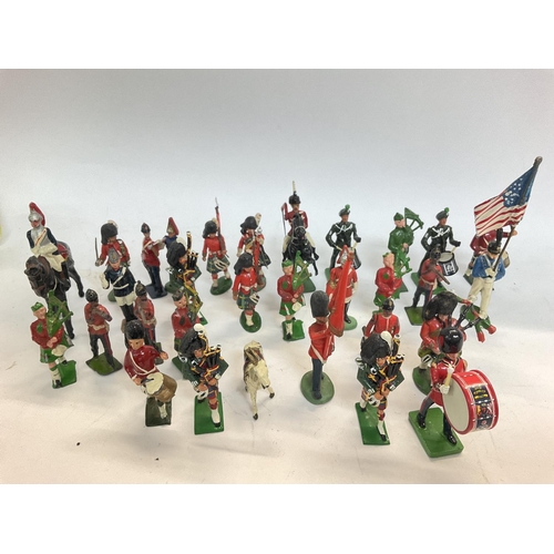 267 - A Collection of Plastic and Diecast Soldiers including some Britains.