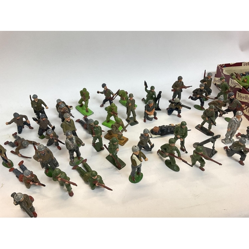 270 - A Box containing various Plastic and Metal American Soldiers. Including Britains.