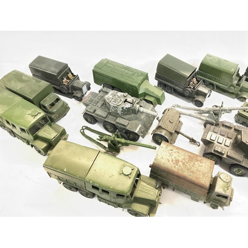 273 - A Collection of Various Diecast Military Vehicles Including Dinky. Some Playworn. Etc.