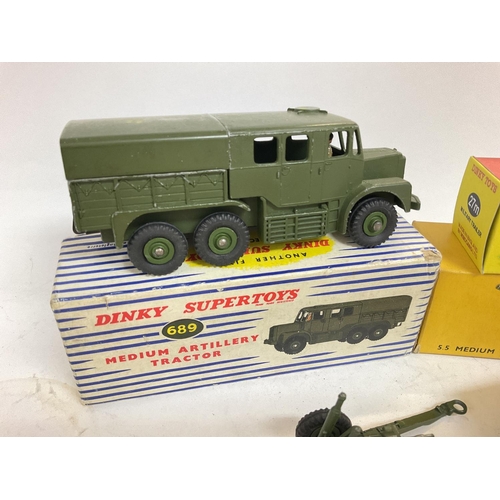 275 - A Boxed Dinky Super Toys Medium Artillery Tractor #689. A 5.5 Medium Gun #692 and a Military Trailer... 