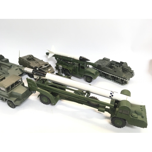 279 - A Collection of Solido and Dinky Missile Launchers etc.