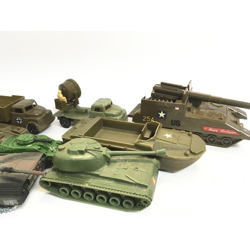 283 - A Box Containing Plastic and Diecast Military Vehicles including Solido.