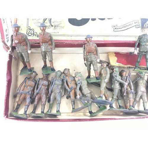 286 - A Britains Box Containing a Collection of British Infantry In Various States.