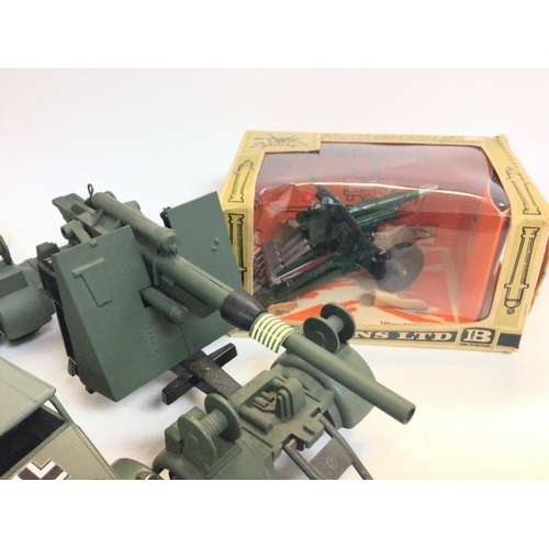 296 - A Collection of various Military Diecast and a Boxed Britains 105MM Pack Howitzer #9724. ( Box Is Wo... 