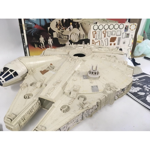 30 - A boxed vintage Star Wars Millenium Falcon with missing or broken parts. Includes instruction leafle... 